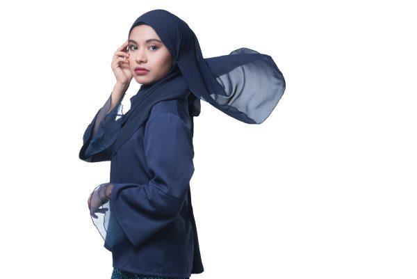 asian girl blue hijab flowing air