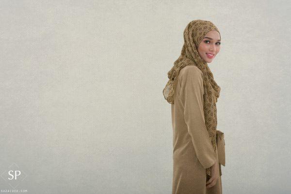 asian girl wearing hijab smiling with brown theme color
