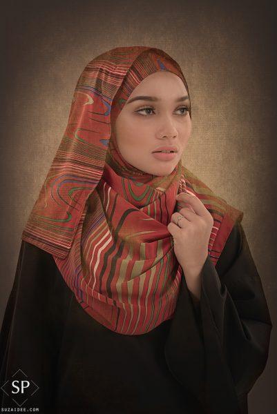 portrait of an asian girl with red hijab