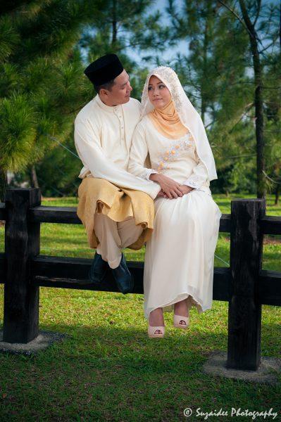 bride groom garden outdoor trees sitting bench