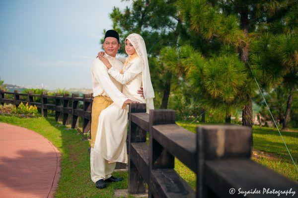 bride groom garden outdoor trees sitting bench