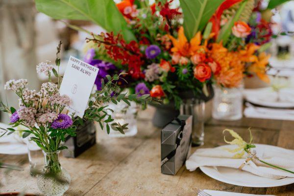 flowers decoration with birthday card and table set