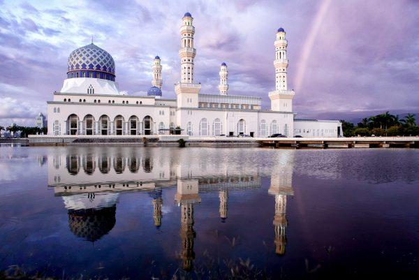 masjid bandaraya kota kinabalu sabah malaysia with reflection and rainbow